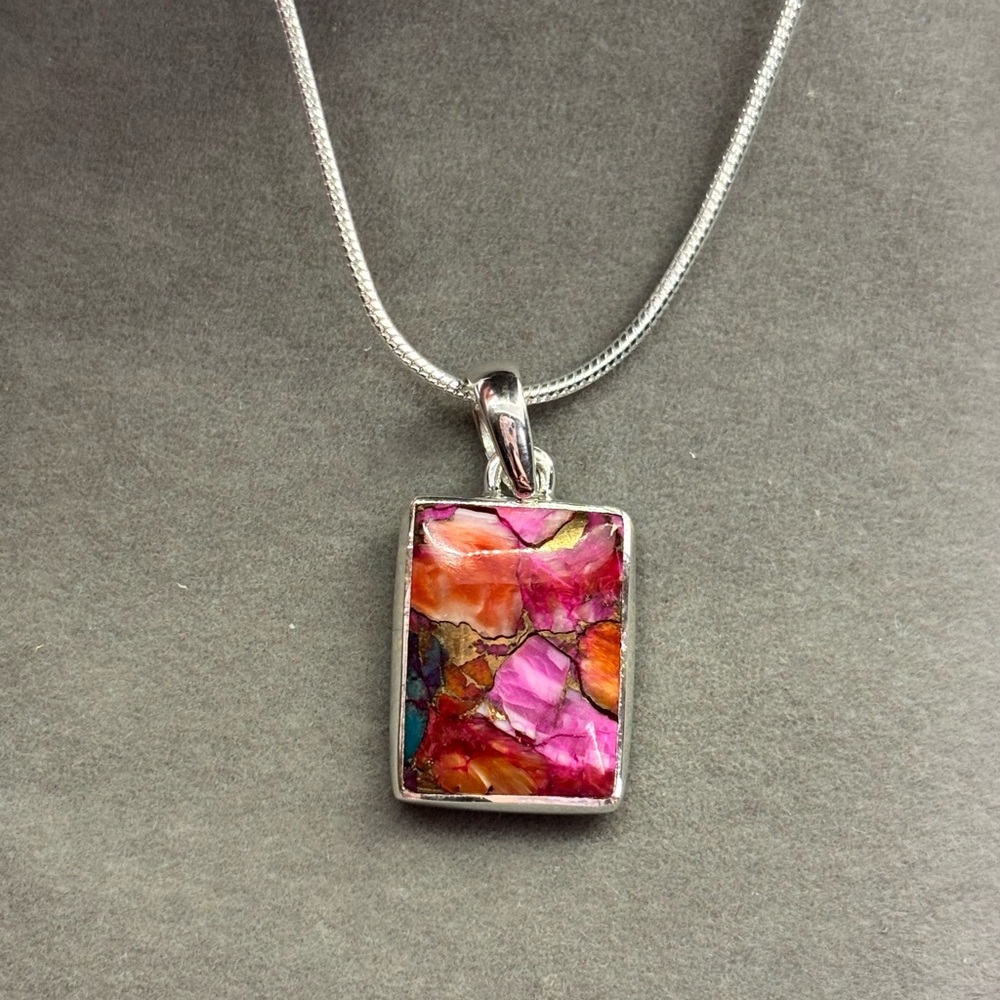 Genuine pink oyster turquoise pendant on a sterling silver chain
